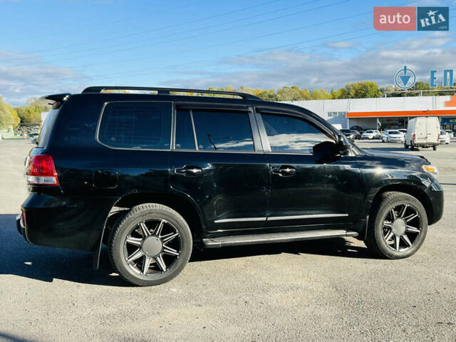 Черный Тойота Ленд Крузер, объемом двигателя 5.7 л и пробегом 239 тыс. км за 23500 $, фото 13 на Automoto.ua