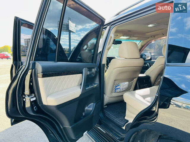 Черный Тойота Ленд Крузер, объемом двигателя 5.7 л и пробегом 239 тыс. км за 23500 $, фото 34 на Automoto.ua