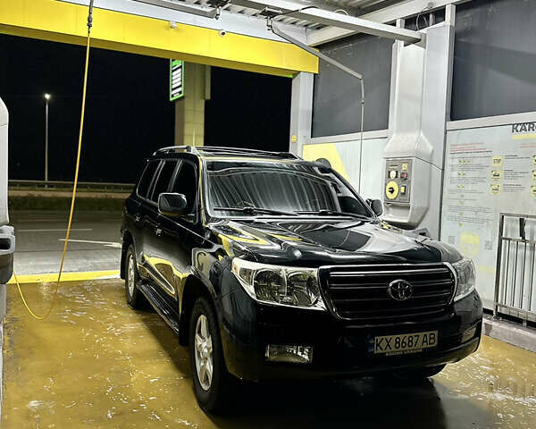 Чорний Тойота Ленд Крузер, об'ємом двигуна 5.66 л та пробігом 289 тис. км за 25000 $, фото 1 на Automoto.ua