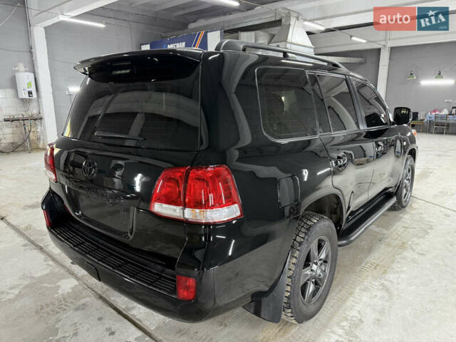 Черный Тойота Ленд Крузер, объемом двигателя 4.46 л и пробегом 155 тыс. км за 25500 $, фото 3 на Automoto.ua