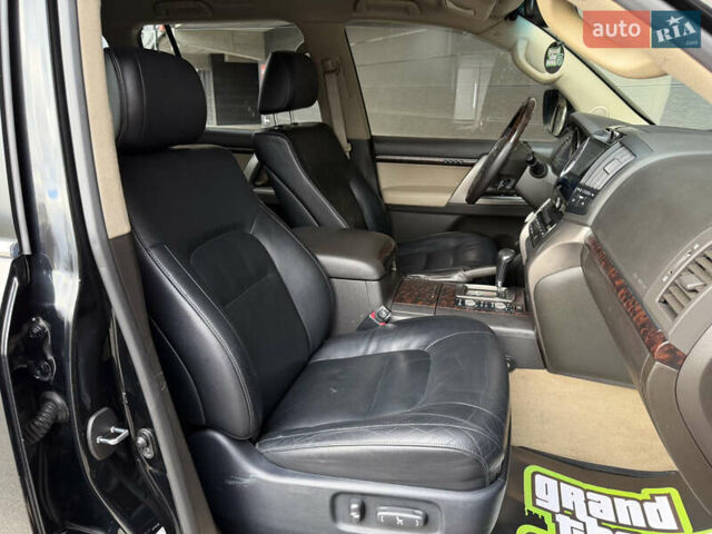 Черный Тойота Ленд Крузер, объемом двигателя 4.7 л и пробегом 170 тыс. км за 29500 $, фото 28 на Automoto.ua