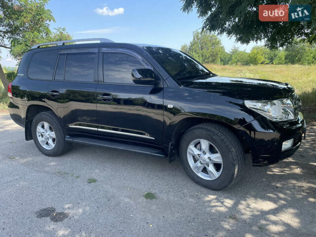 Черный Тойота Ленд Крузер, объемом двигателя 4.46 л и пробегом 305 тыс. км за 30500 $, фото 3 на Automoto.ua