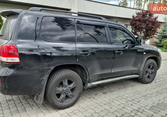 Черный Тойота Ленд Крузер, объемом двигателя 4.46 л и пробегом 294 тыс. км за 30000 $, фото 5 на Automoto.ua