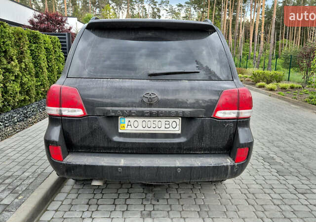 Черный Тойота Ленд Крузер, объемом двигателя 4.46 л и пробегом 294 тыс. км за 30000 $, фото 4 на Automoto.ua