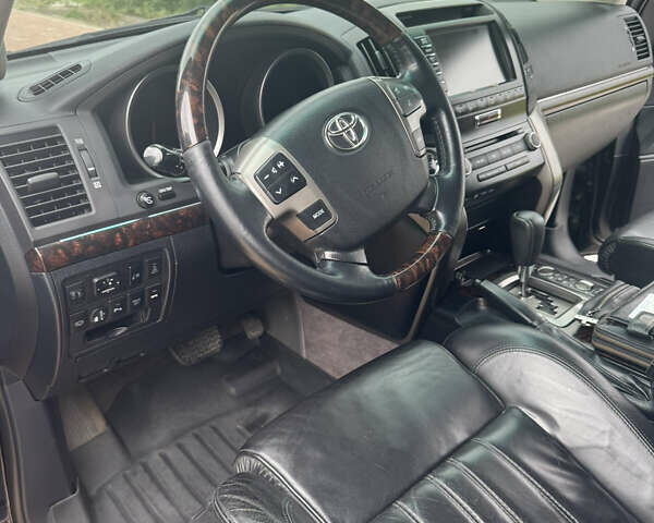 Чорний Тойота Ленд Крузер, об'ємом двигуна 4.46 л та пробігом 390 тис. км за 27000 $, фото 4 на Automoto.ua