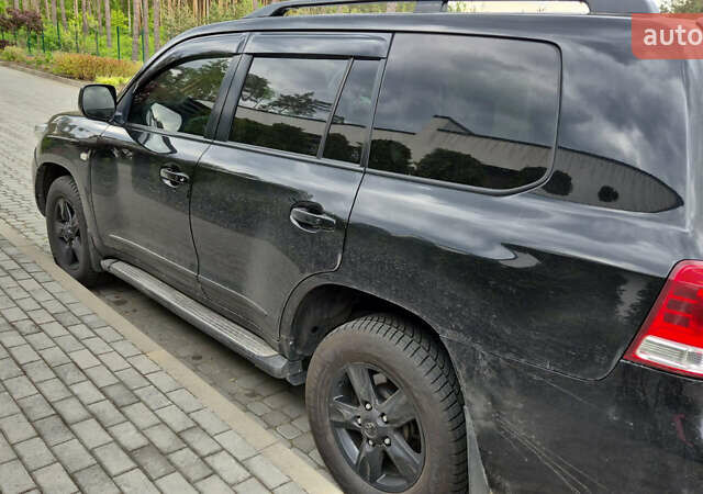 Черный Тойота Ленд Крузер, объемом двигателя 4.46 л и пробегом 294 тыс. км за 30000 $, фото 6 на Automoto.ua