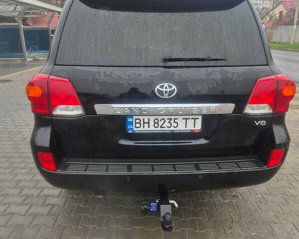 Чорний Тойота Ленд Крузер, об'ємом двигуна 4.46 л та пробігом 300 тис. км за 33000 $, фото 2 на Automoto.ua