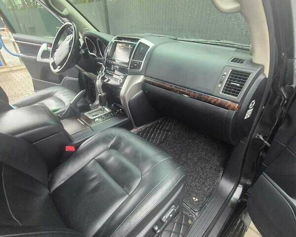 Чорний Тойота Ленд Крузер, об'ємом двигуна 4.46 л та пробігом 300 тис. км за 33000 $, фото 13 на Automoto.ua
