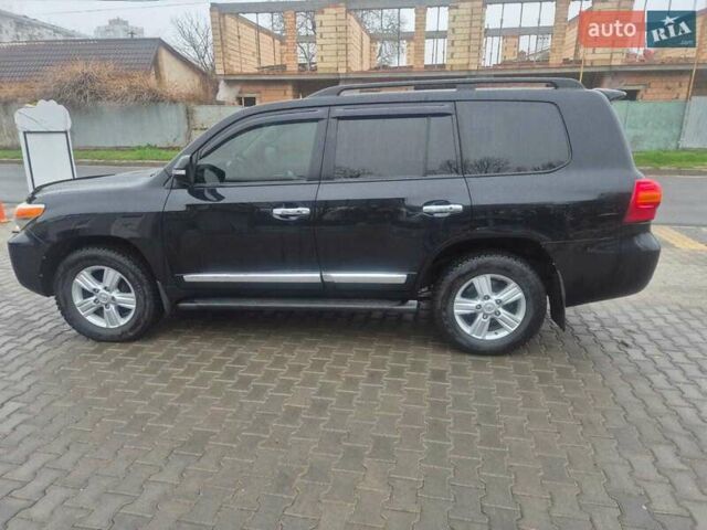 Чорний Тойота Ленд Крузер, об'ємом двигуна 4.46 л та пробігом 300 тис. км за 33000 $, фото 3 на Automoto.ua