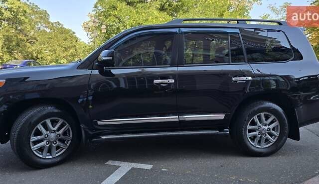 Чорний Тойота Ленд Крузер, об'ємом двигуна 4.61 л та пробігом 305 тис. км за 29000 $, фото 6 на Automoto.ua