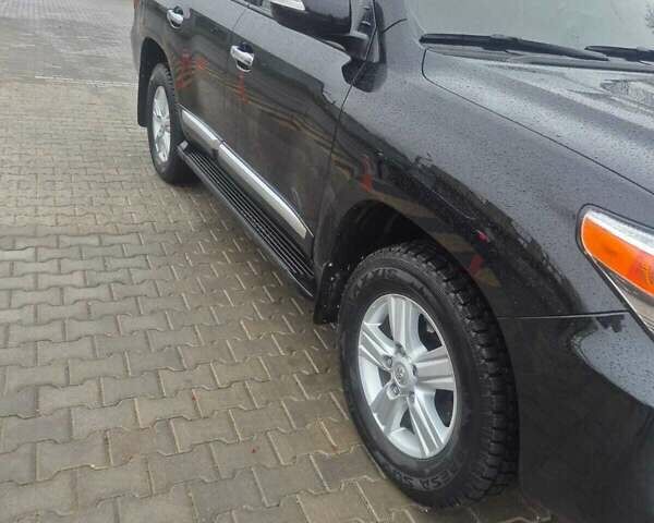 Чорний Тойота Ленд Крузер, об'ємом двигуна 4.46 л та пробігом 300 тис. км за 33000 $, фото 5 на Automoto.ua