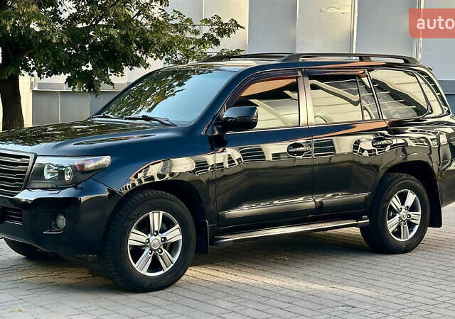 Чорний Тойота Ленд Крузер, об'ємом двигуна 4.46 л та пробігом 290 тис. км за 39000 $, фото 1 на Automoto.ua