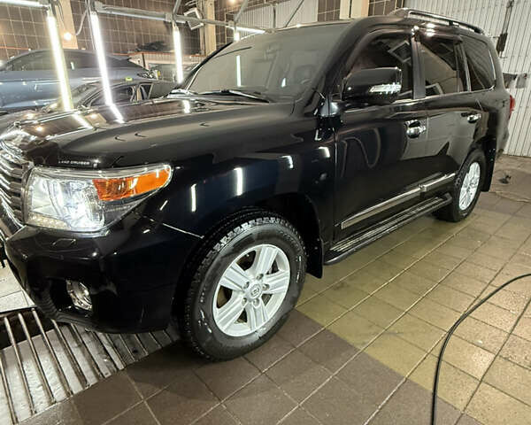 Черный Тойота Ленд Крузер, объемом двигателя 4.46 л и пробегом 140 тыс. км за 41000 $, фото 1 на Automoto.ua