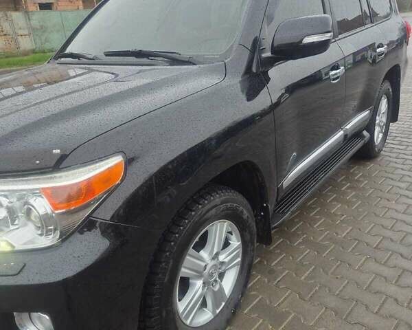 Чорний Тойота Ленд Крузер, об'ємом двигуна 4.46 л та пробігом 300 тис. км за 33000 $, фото 4 на Automoto.ua