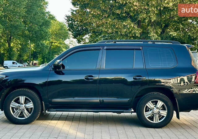 Чорний Тойота Ленд Крузер, об'ємом двигуна 4.46 л та пробігом 290 тис. км за 39000 $, фото 8 на Automoto.ua