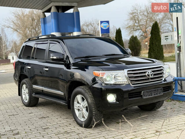 Черный Тойота Ленд Крузер, объемом двигателя 0 л и пробегом 219 тыс. км за 29600 $, фото 102 на Automoto.ua