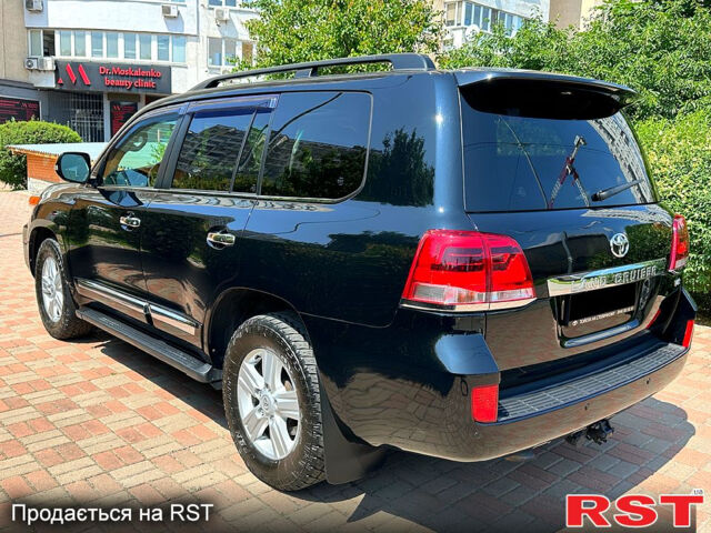 Черный Тойота Ленд Крузер, объемом двигателя 4.6 л и пробегом 310 тыс. км за 29999 $, фото 1 на Automoto.ua