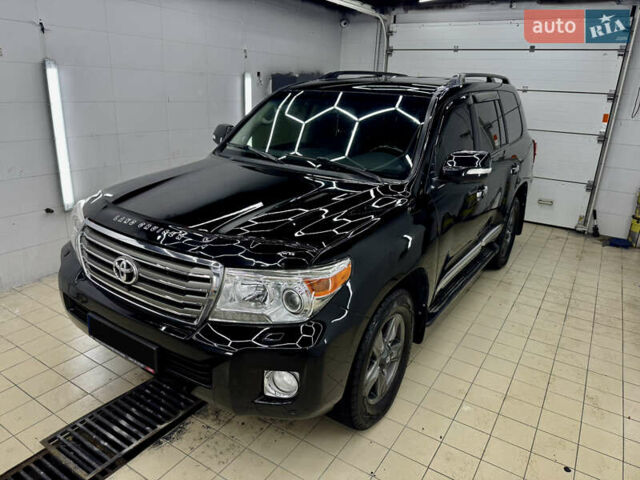Черный Тойота Ленд Крузер, объемом двигателя 4.5 л и пробегом 318 тыс. км за 28990 $, фото 1 на Automoto.ua