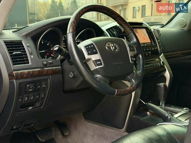 Черный Тойота Ленд Крузер, объемом двигателя 4.5 л и пробегом 274 тыс. км за 31500 $, фото 25 на Automoto.ua