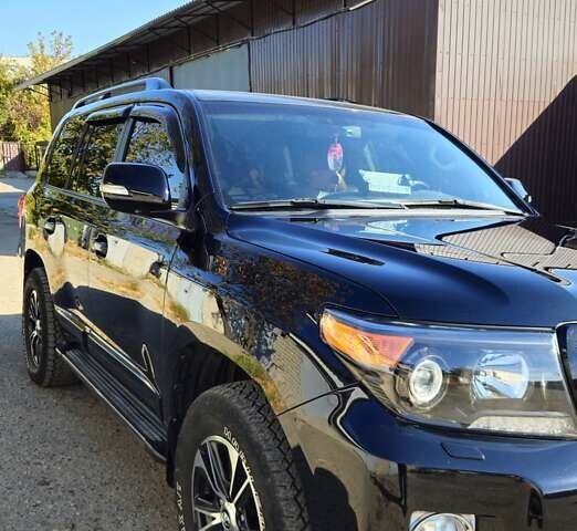 Черный Тойота Ленд Крузер, объемом двигателя 4.5 л и пробегом 175 тыс. км за 39000 $, фото 2 на Automoto.ua