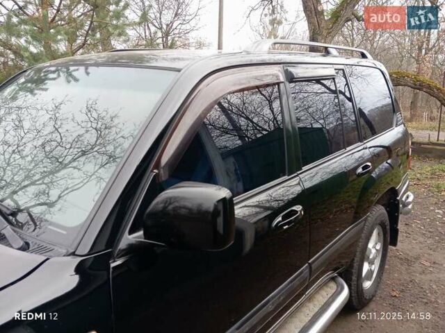 Коричневый Тойота Ленд Крузер, объемом двигателя 4.66 л и пробегом 260 тыс. км за 14000 $, фото 10 на Automoto.ua