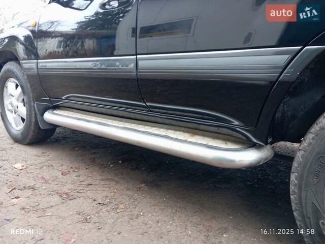 Коричневый Тойота Ленд Крузер, объемом двигателя 4.66 л и пробегом 260 тыс. км за 14000 $, фото 9 на Automoto.ua