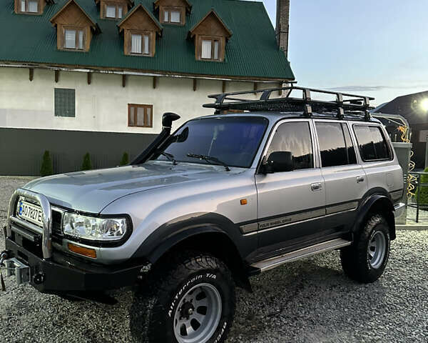 Сірий Тойота Ленд Крузер, об'ємом двигуна 4.2 л та пробігом 314 тис. км за 15000 $, фото 1 на Automoto.ua