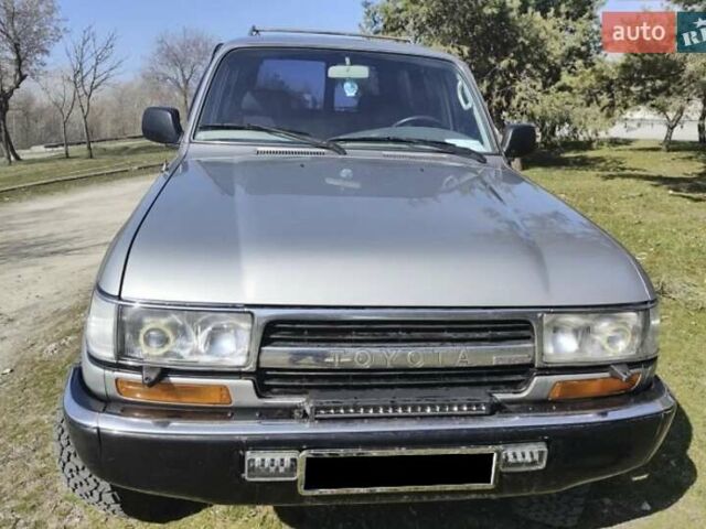 Серый Тойота Ленд Крузер, объемом двигателя 4.2 л и пробегом 380 тыс. км за 17000 $, фото 5 на Automoto.ua