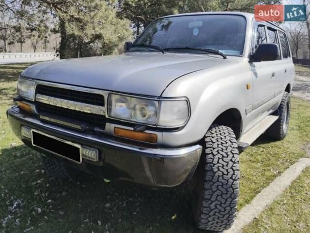 Серый Тойота Ленд Крузер, объемом двигателя 4.2 л и пробегом 380 тыс. км за 17000 $, фото 3 на Automoto.ua