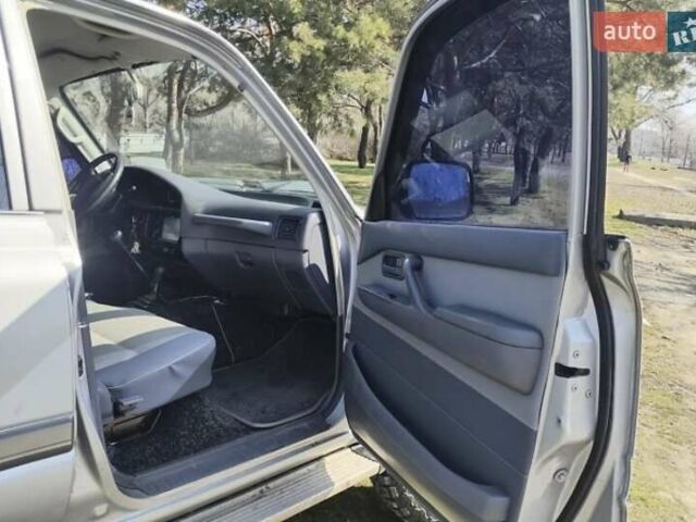 Серый Тойота Ленд Крузер, объемом двигателя 4.2 л и пробегом 380 тыс. км за 17000 $, фото 8 на Automoto.ua