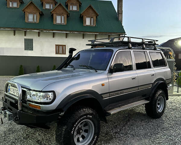 Сірий Тойота Ленд Крузер, об'ємом двигуна 4.2 л та пробігом 314 тис. км за 15000 $, фото 2 на Automoto.ua