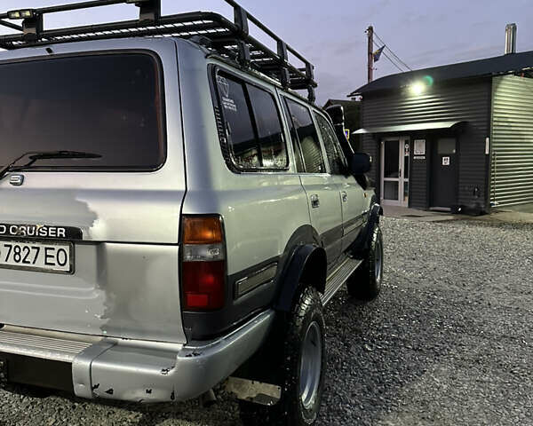 Сірий Тойота Ленд Крузер, об'ємом двигуна 4.2 л та пробігом 314 тис. км за 15000 $, фото 7 на Automoto.ua