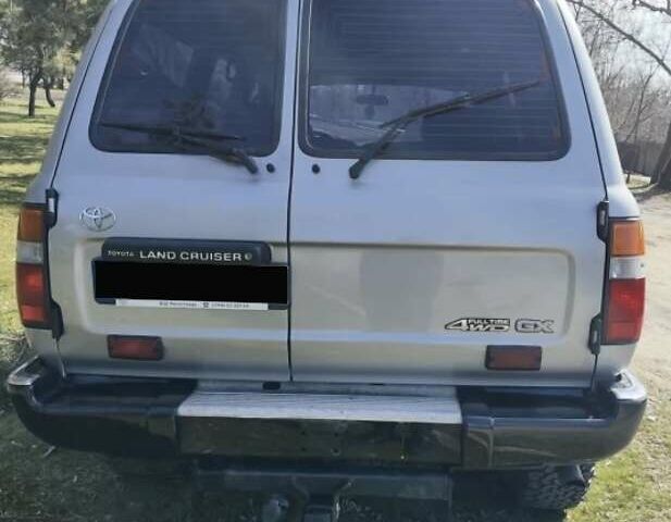 Серый Тойота Ленд Крузер, объемом двигателя 4.2 л и пробегом 380 тыс. км за 17000 $, фото 6 на Automoto.ua