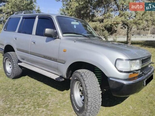 Серый Тойота Ленд Крузер, объемом двигателя 4.2 л и пробегом 380 тыс. км за 17000 $, фото 4 на Automoto.ua