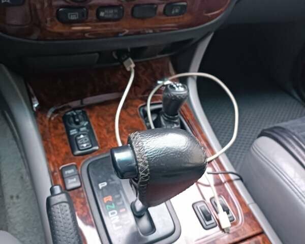 Сірий Тойота Ленд Крузер, об'ємом двигуна 4.2 л та пробігом 422 тис. км за 14300 $, фото 4 на Automoto.ua