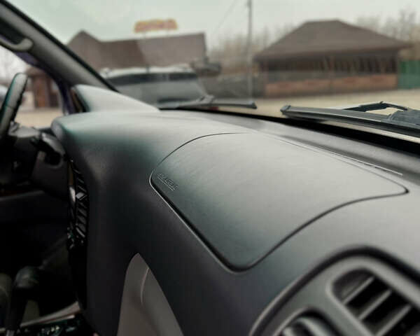 Серый Тойота Ленд Крузер, объемом двигателя 4.7 л и пробегом 421 тыс. км за 11650 $, фото 25 на Automoto.ua