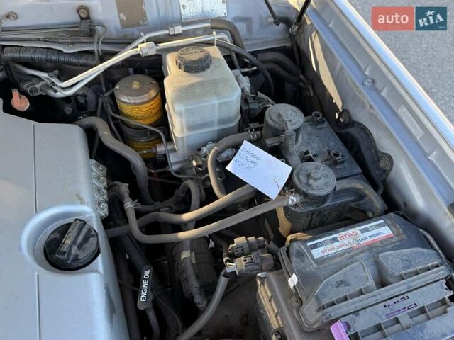 Серый Тойота Ленд Крузер, объемом двигателя 4.66 л и пробегом 342 тыс. км за 15500 $, фото 24 на Automoto.ua