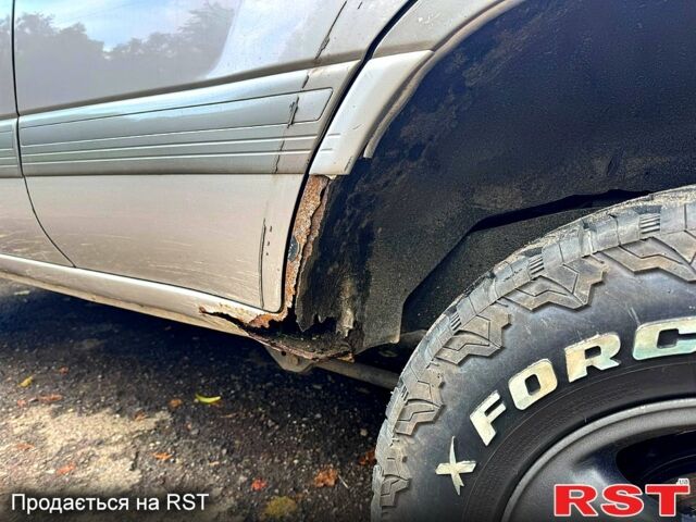 Серый Тойота Ленд Крузер, объемом двигателя 4.7 л и пробегом 419 тыс. км за 10000 $, фото 2 на Automoto.ua