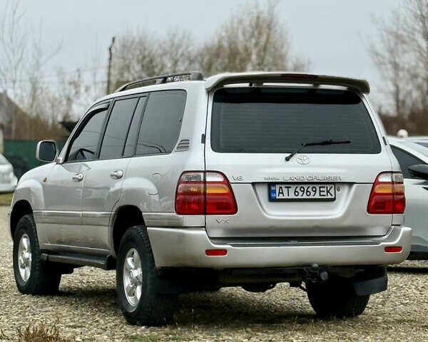 Серый Тойота Ленд Крузер, объемом двигателя 4.7 л и пробегом 421 тыс. км за 11650 $, фото 11 на Automoto.ua