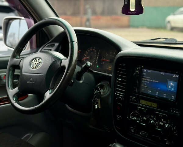 Серый Тойота Ленд Крузер, объемом двигателя 4.7 л и пробегом 421 тыс. км за 11650 $, фото 27 на Automoto.ua