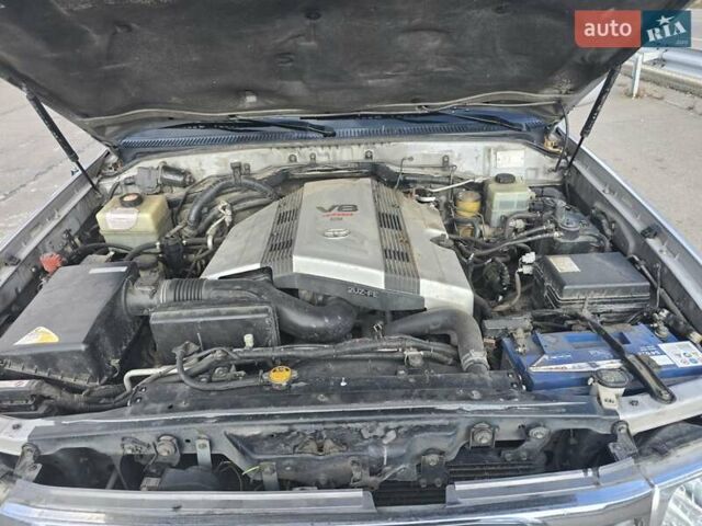 Серый Тойота Ленд Крузер, объемом двигателя 4.7 л и пробегом 402 тыс. км за 12500 $, фото 8 на Automoto.ua