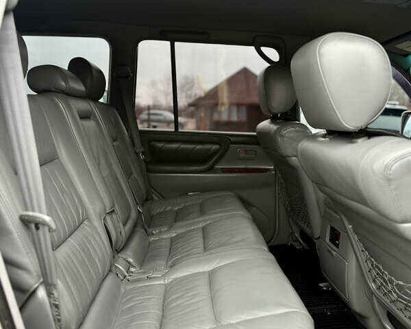 Серый Тойота Ленд Крузер, объемом двигателя 4.7 л и пробегом 421 тыс. км за 11650 $, фото 29 на Automoto.ua