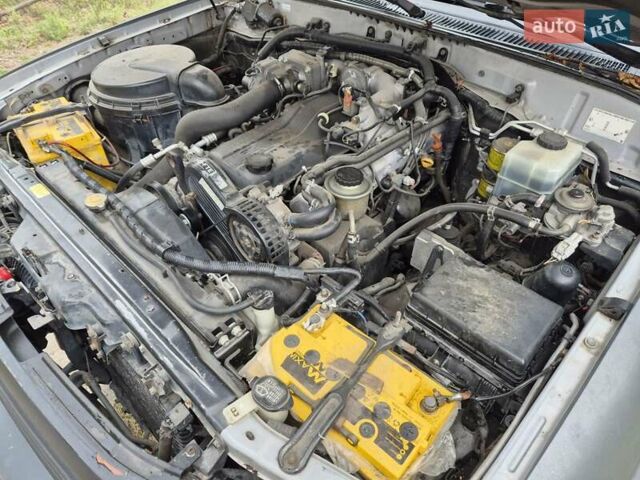 Серый Тойота Ленд Крузер, объемом двигателя 4.2 л и пробегом 453 тыс. км за 16500 $, фото 27 на Automoto.ua