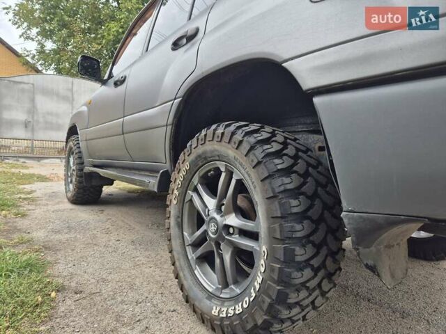 Серый Тойота Ленд Крузер, объемом двигателя 4.2 л и пробегом 453 тыс. км за 16500 $, фото 7 на Automoto.ua