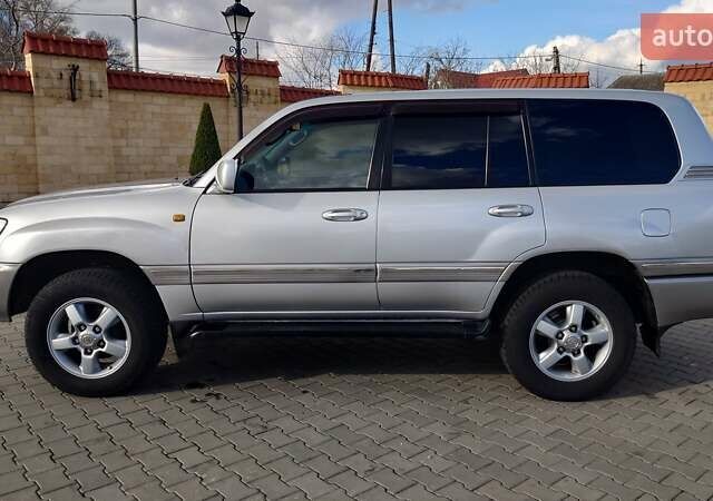 Сірий Тойота Ленд Крузер, об'ємом двигуна 4.2 л та пробігом 259 тис. км за 30000 $, фото 4 на Automoto.ua