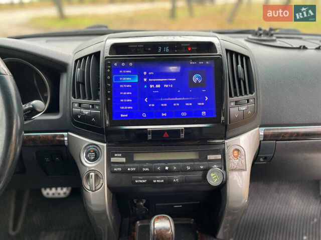 Серый Тойота Ленд Крузер, объемом двигателя 4.7 л и пробегом 352 тыс. км за 21600 $, фото 21 на Automoto.ua