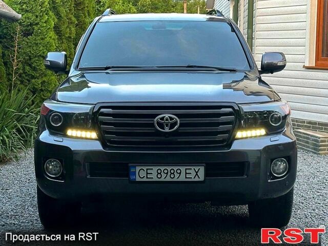Серый Тойота Ленд Крузер, объемом двигателя 4.5 л и пробегом 232 тыс. км за 32900 $, фото 2 на Automoto.ua