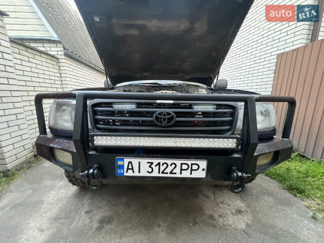 Синій Тойота Ленд Крузер, об'ємом двигуна 4.7 л та пробігом 360 тис. км за 11000 $, фото 4 на Automoto.ua