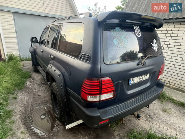 Синій Тойота Ленд Крузер, об'ємом двигуна 4.7 л та пробігом 360 тис. км за 11000 $, фото 2 на Automoto.ua