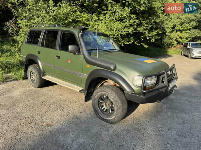 Зеленый Тойота Ленд Крузер, объемом двигателя 4.5 л и пробегом 400 тыс. км за 10500 $, фото 4 на Automoto.ua